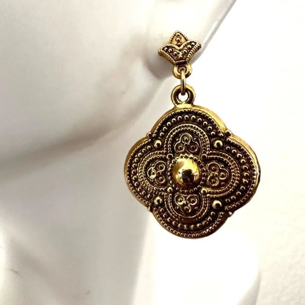 Gold tone textured drop earrings